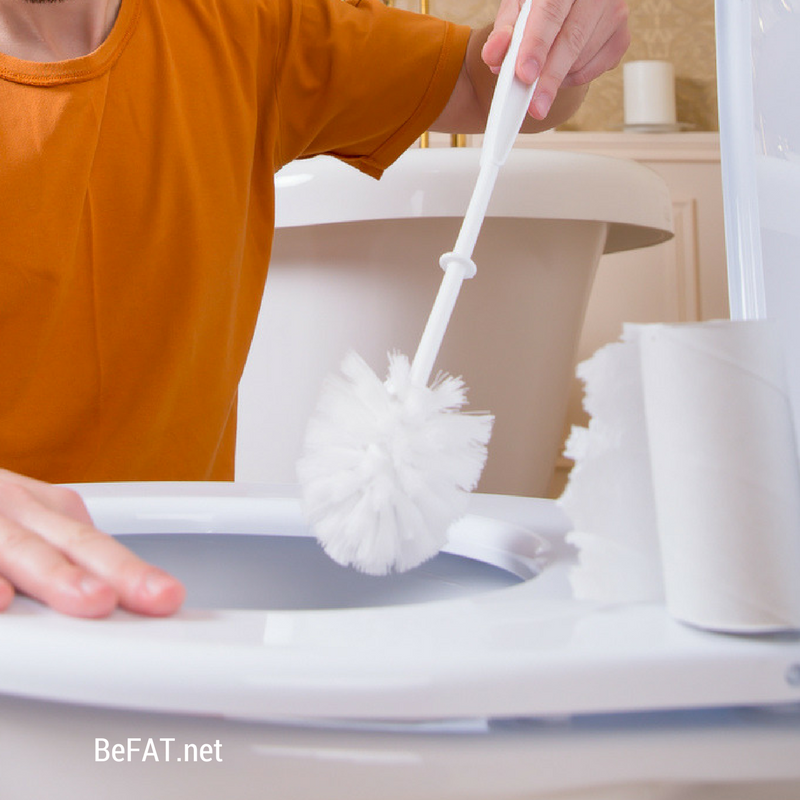 person cleaning toilet.jpg